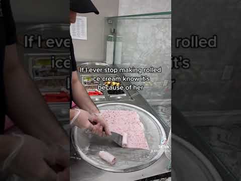 Making rolled ice cream for a regular customer